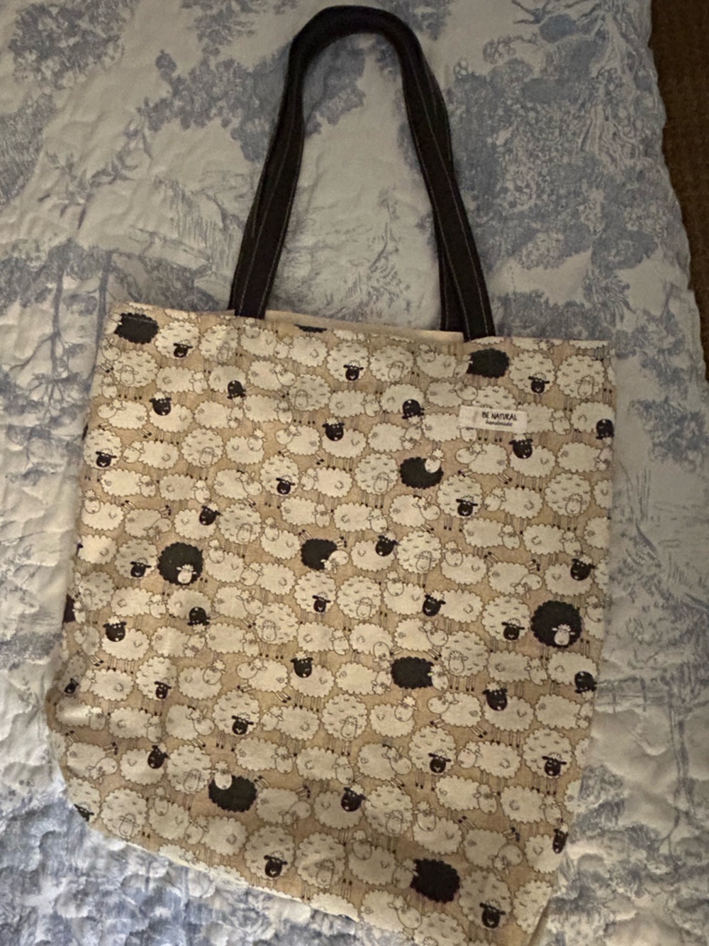Playful Beige Sheep-Print Tote with Black Handles